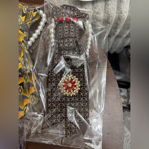 UPCYCLE Geometric Patterned Tie necklace with Red and Gold Accents